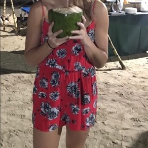 Floral romper with cross back detail